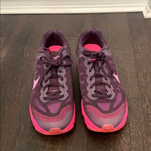 Pink and purple pair of Nike running shoes - Picture 2 of 3